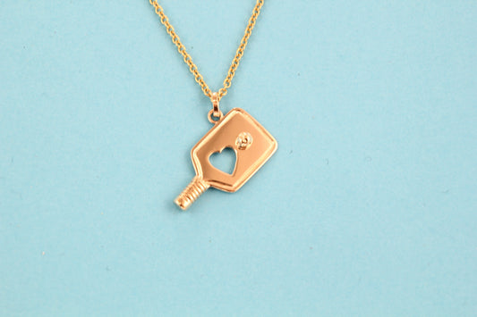 Item 18 "I give my heart" 14 Kt. yellow gold paddle pendant.