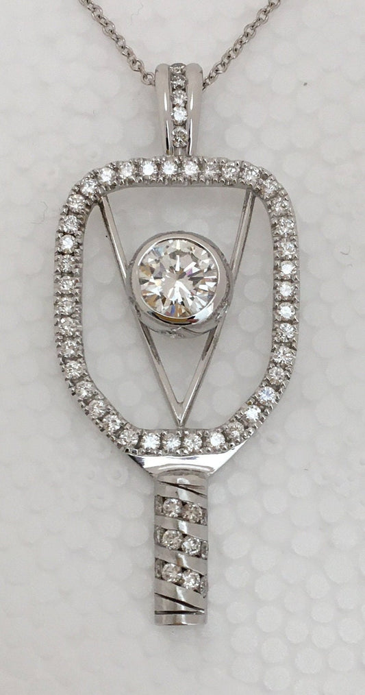 Item #118  18 kt. gold all diamonds pickleball paddle pendant.