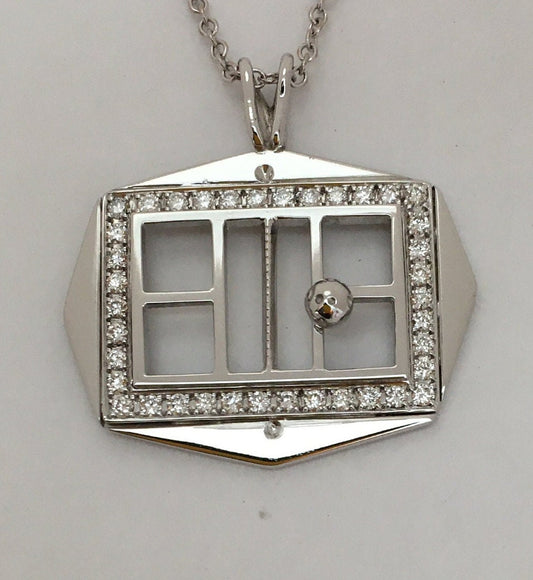 Item#89. Pendant 14kt. gold and diamonds pickle ball court with ball.